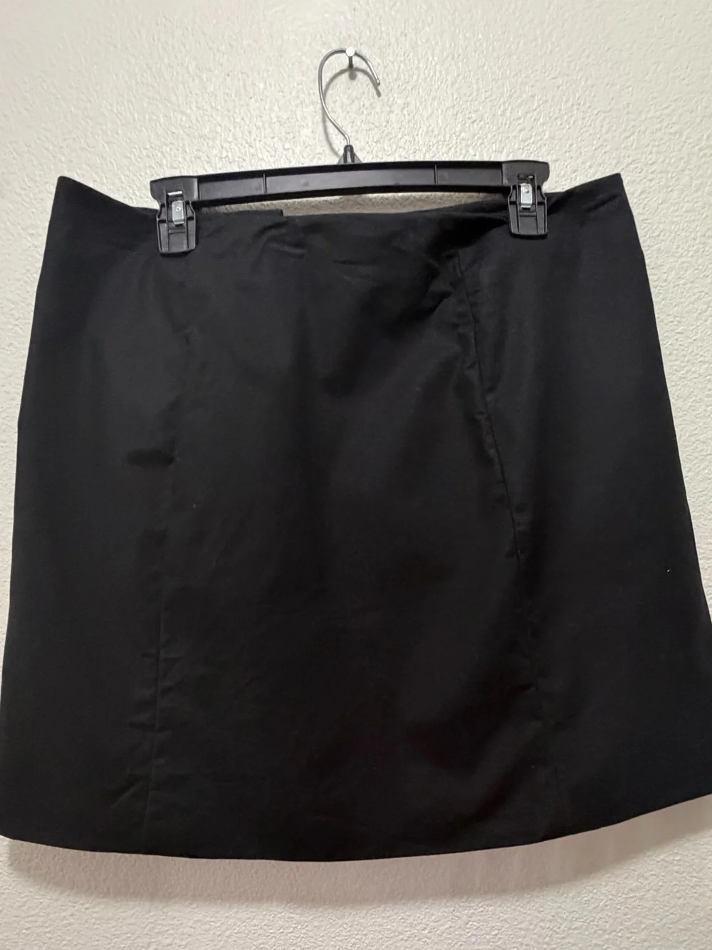 Michael Kors black lined mini skirt with double row silver buttons